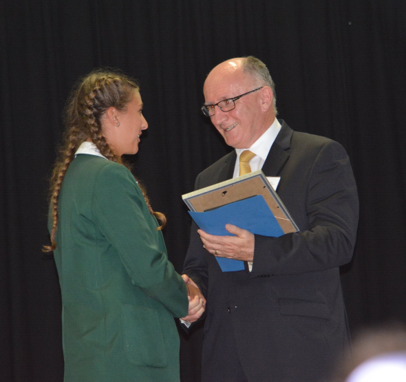 Tayla receiving her award. 