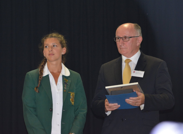 Tayla receiving her award. 
