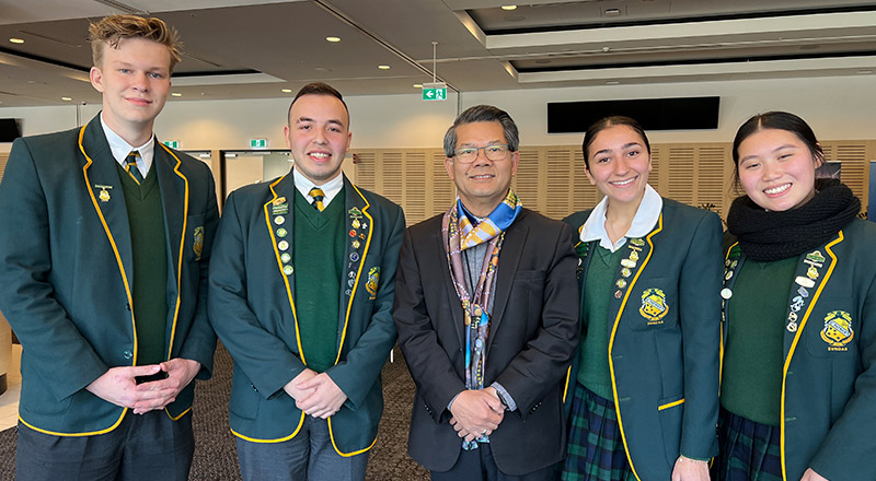 Students with Bishop Vincent Long at St Patrick's Marist College Dundas