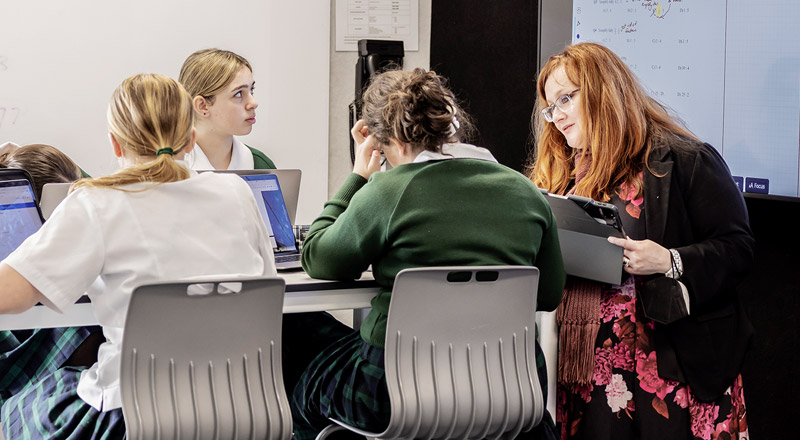 Teacher with students at St Patrick's Marist College Dundas