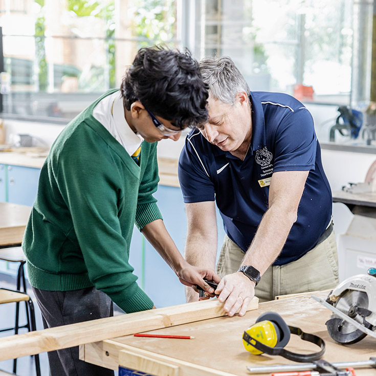TAS teacher with student at St Patrick's Marist College Dundas